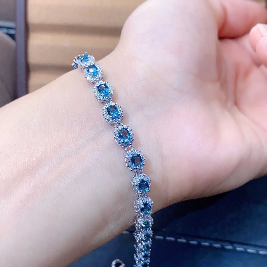 Natural Blue Topaz Bracelet Crystal Inlaid With Precision, This exquisite natural blue topaz bracelet features crystals inlaid with meticulous precision, showcasing the gemstone's stunning clarity and vibrant blue hue. - CRYSTALOIL