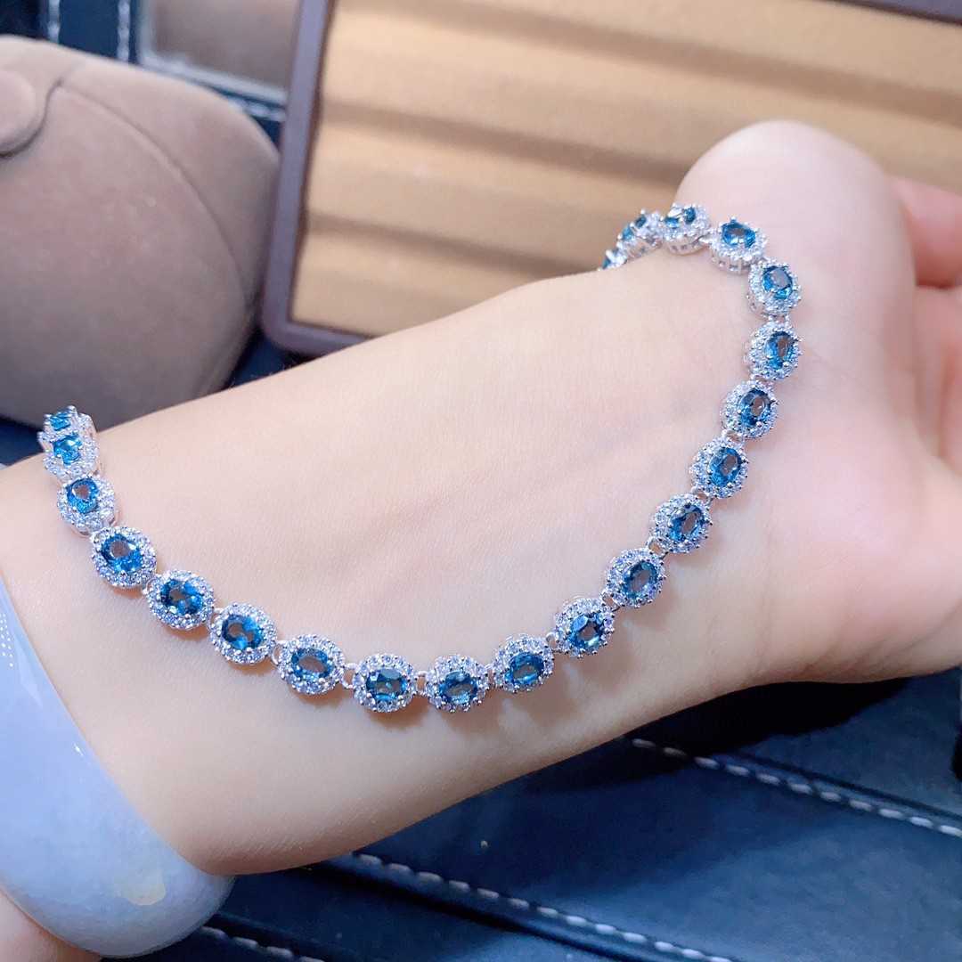 Natural Blue Topaz Bracelet Crystal Inlaid With Precision, This exquisite natural blue topaz bracelet features crystals inlaid with meticulous precision, showcasing the gemstone's stunning clarity and vibrant blue hue. - CRYSTALOIL
