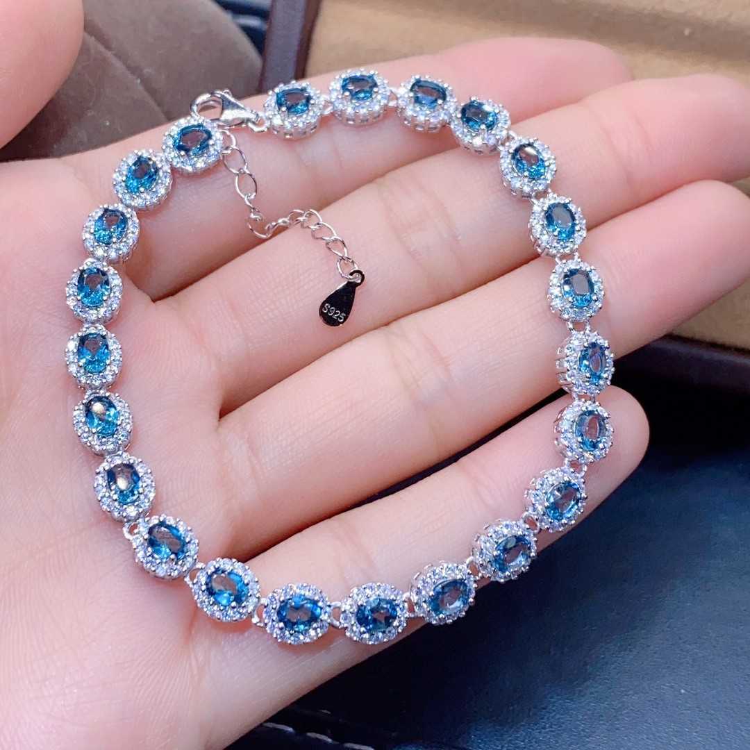 Natural Blue Topaz Bracelet Crystal Inlaid With Precision, This exquisite natural blue topaz bracelet features crystals inlaid with meticulous precision, showcasing the gemstone's stunning clarity and vibrant blue hue. - CRYSTALOIL
