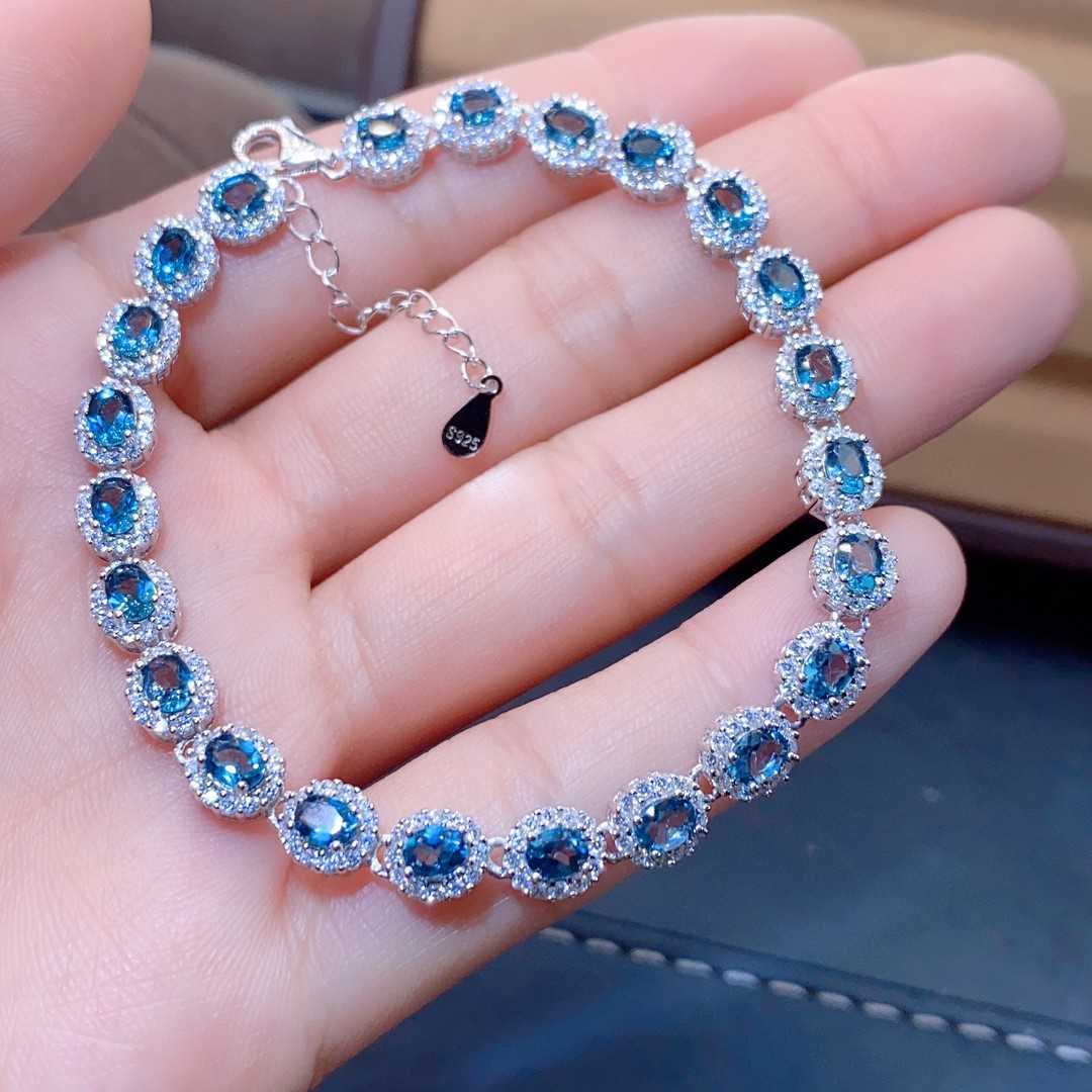 Natural Blue Topaz Bracelet Crystal Inlaid With Precision, This exquisite natural blue topaz bracelet features crystals inlaid with meticulous precision, showcasing the gemstone's stunning clarity and vibrant blue hue. - CRYSTALOIL