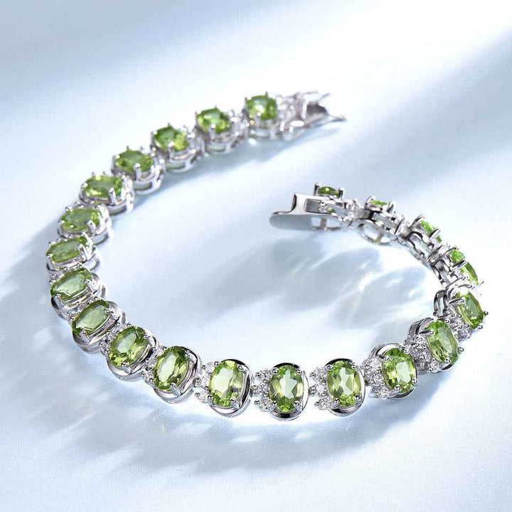 Sterling Silver Natural Peridot Bracelet Gemstones, exuding elegance and sophistication with its shimmering green hues. - CRYSTALOIL