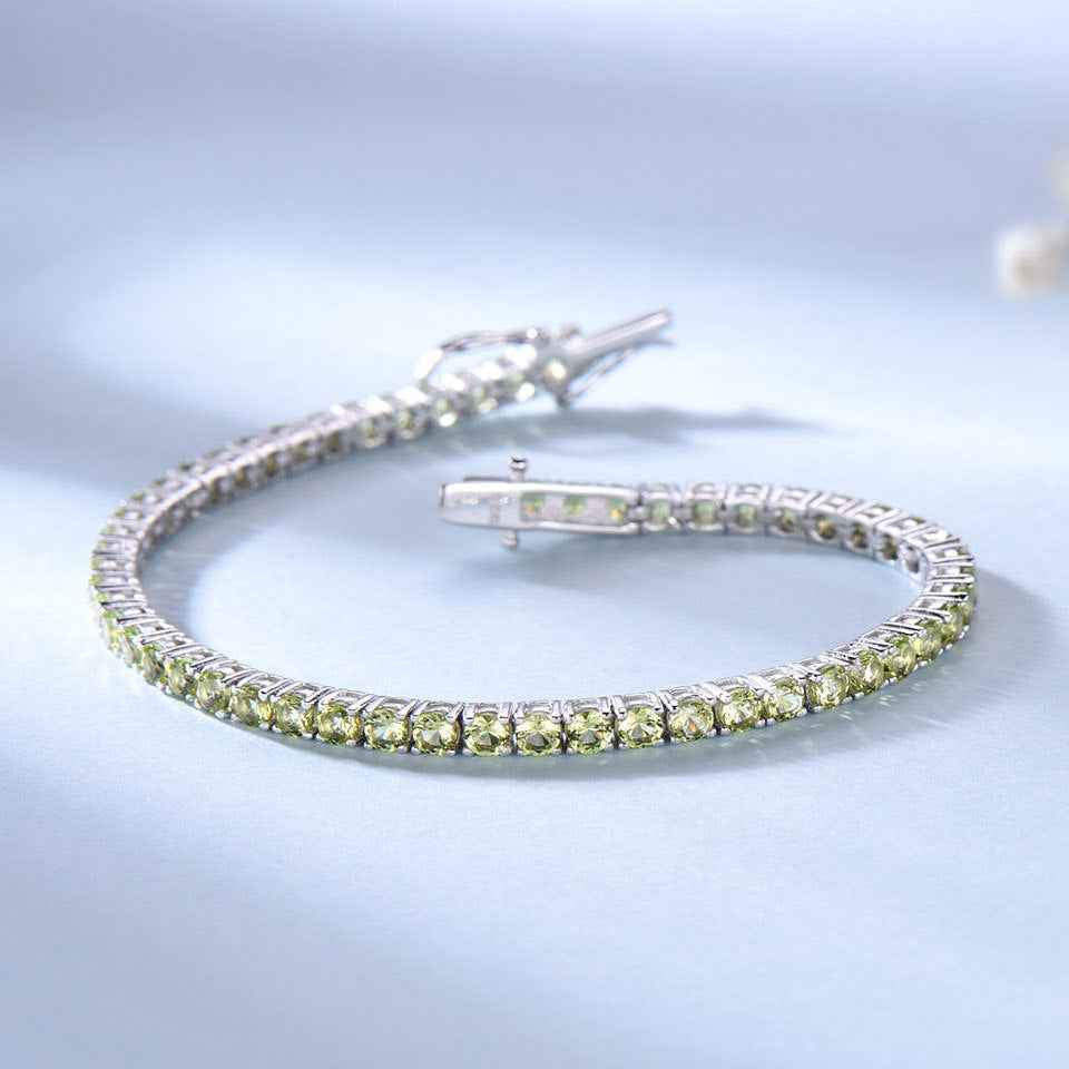 Sterling Silver Full Of CRYSTALS Luxury Peridot Bracelet , A Sterling Silver Luxury Peridot Bracelet, adorned with dazzling diamonds, radiating opulence and sophistication with its exquisite blend of shimmering gemstones. - CRYSTALOIL