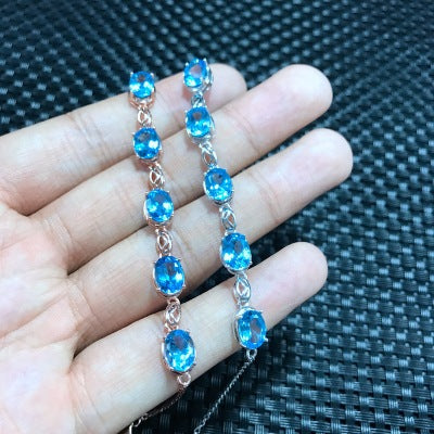 Natural Topaz Bracelet,  "Indulge in luxury with our Natural Topaz Bracelet, meticulously crafted from 925 sterling silver and adorned with Mozambique stones,.