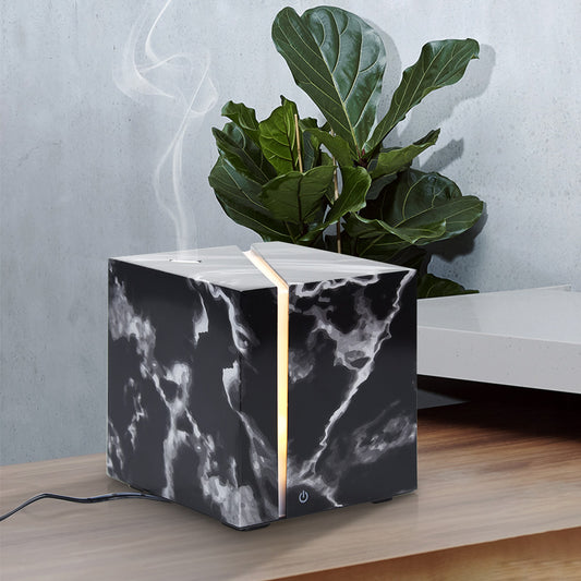 Marble pattern aromatherapy diffuser,  "Elevate your aromatherapy experience with our Marble Pattern Aromatherapy Diffuser, blending style and functionality seamlessly. Featuring a sophisticated marble pattern - Crystalbloomaromatics