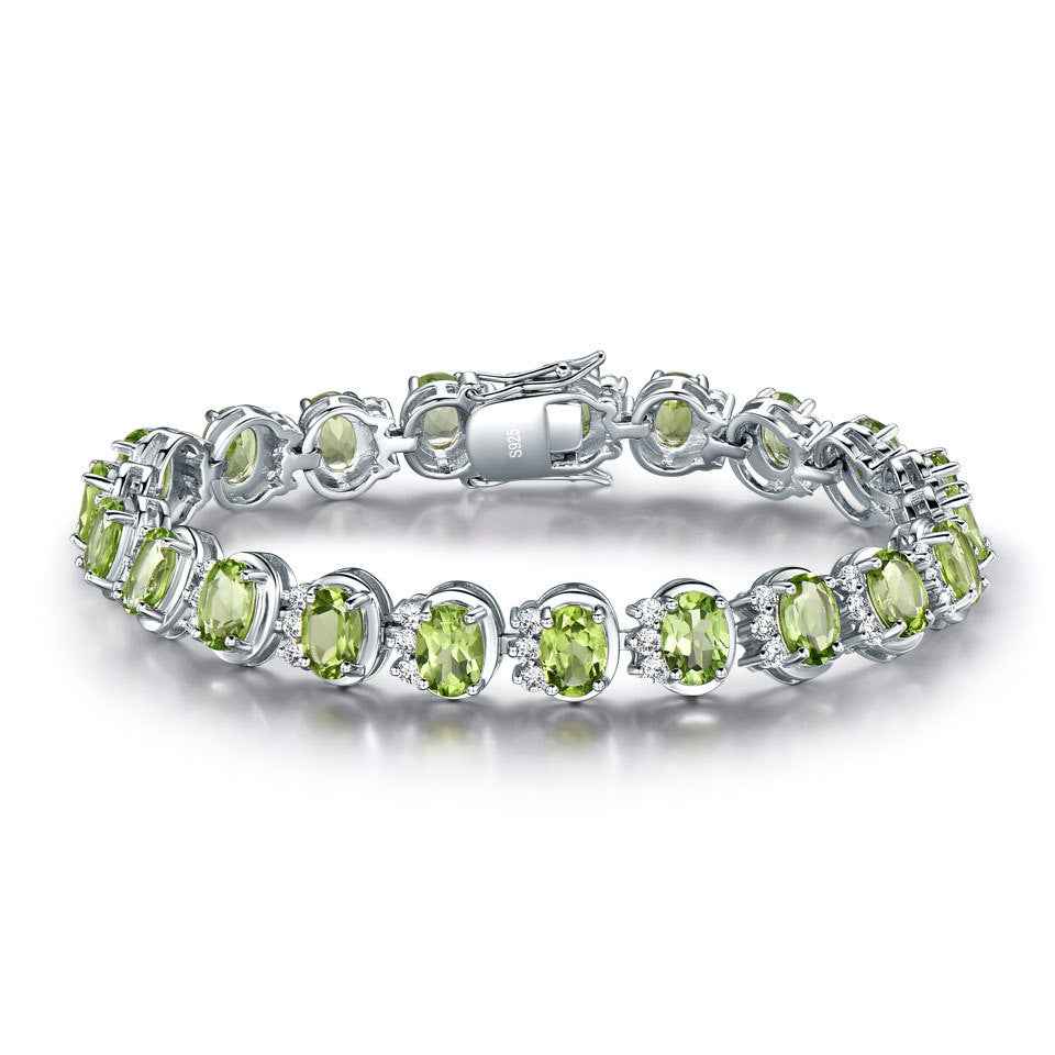 Sterling Silver Natural Peridot Bracelet Gemstones, exuding elegance and sophistication with its shimmering green hues. - CRYSTALOIL