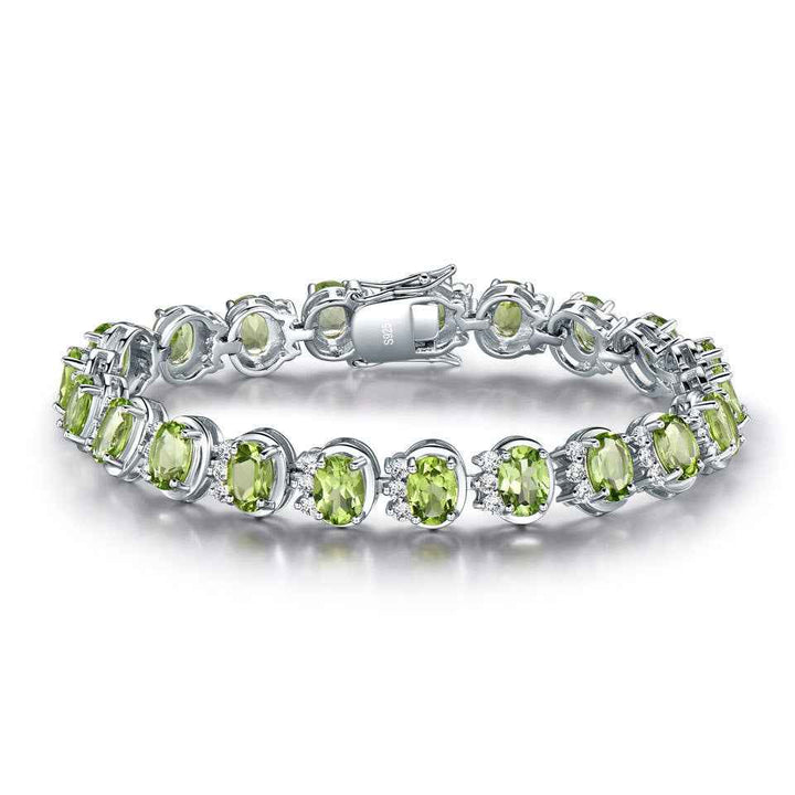 Sterling Silver Natural Peridot Bracelet Gemstones, exuding elegance and sophistication with its shimmering green hues. - CRYSTALOIL