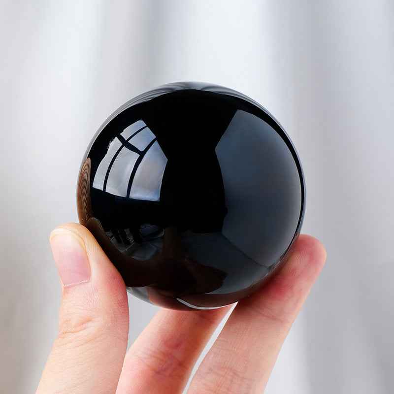 Natural Obsidian Crystal Ball ,  Discover the mystique of the cosmos with a natural obsidian crystal ball, - CRYSTALOIL