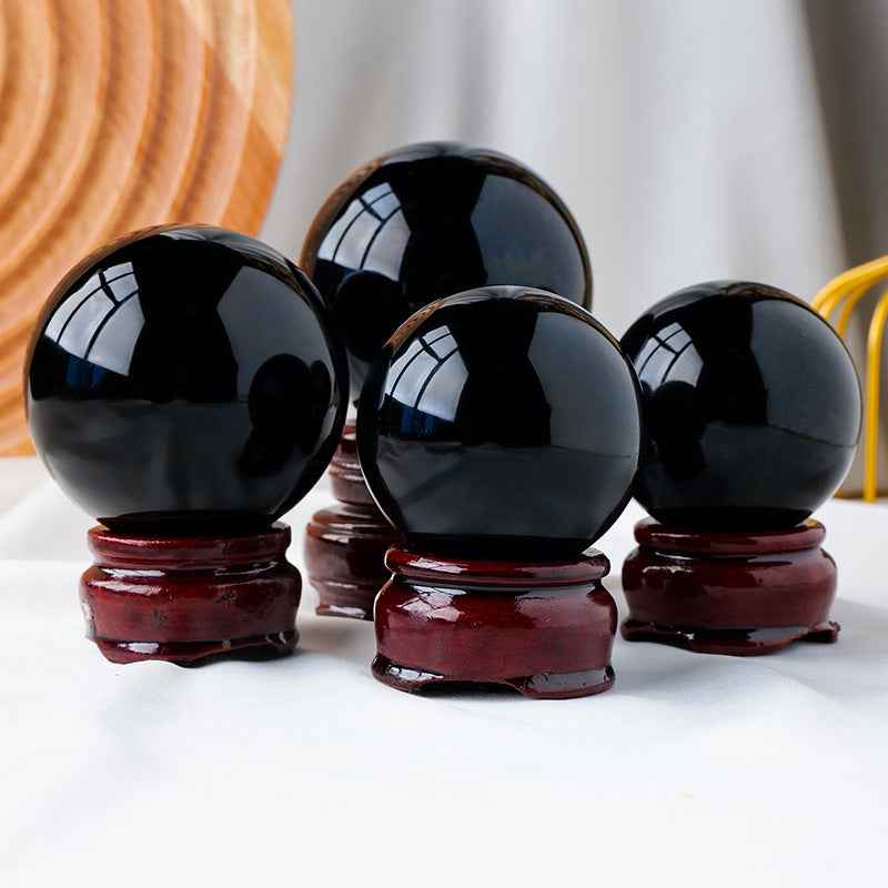 Natural Obsidian Crystal Ball ,  Discover the mystique of the cosmos with a natural obsidian crystal ball, - CRYSTALOIL