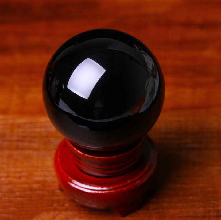 Natural Obsidian Crystal Ball ,  Discover the mystique of the cosmos with a natural obsidian crystal ball, - CRYSTALOIL